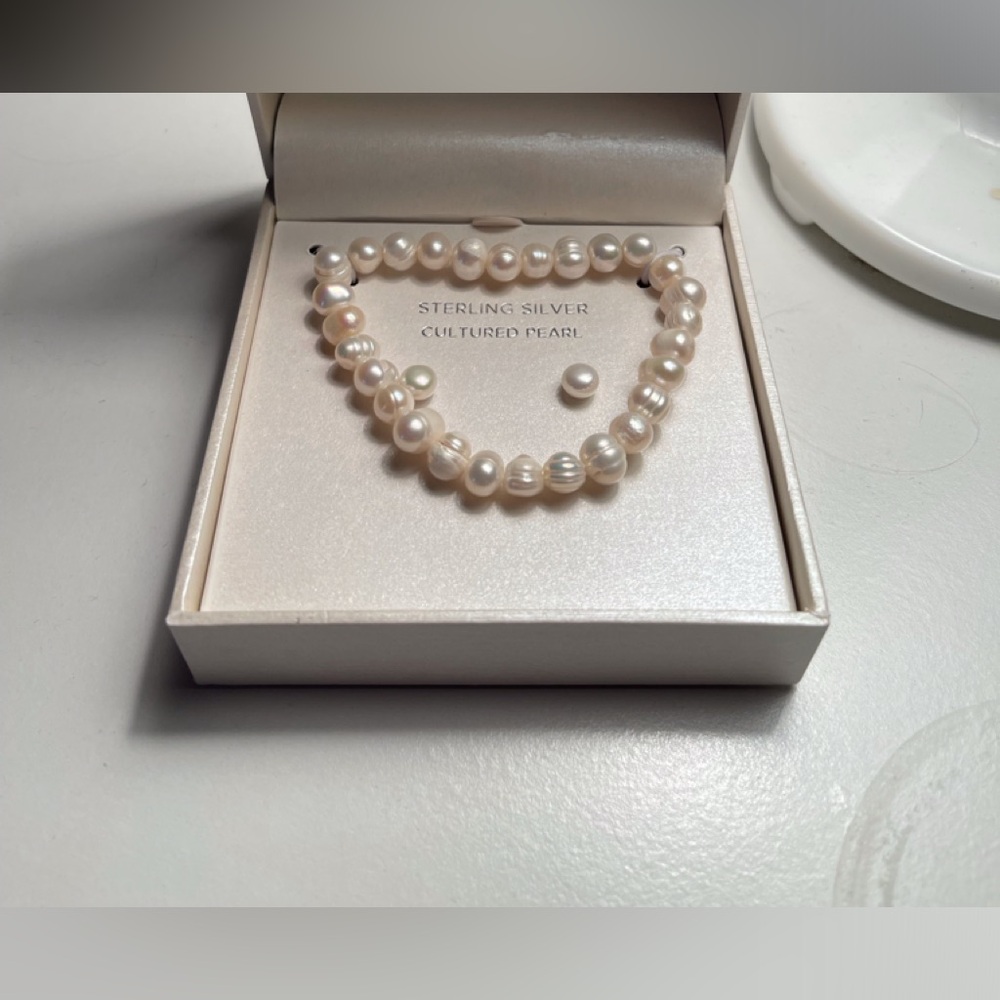 Cultured pearl earrings sterling silver and cultured pearl bracelet.